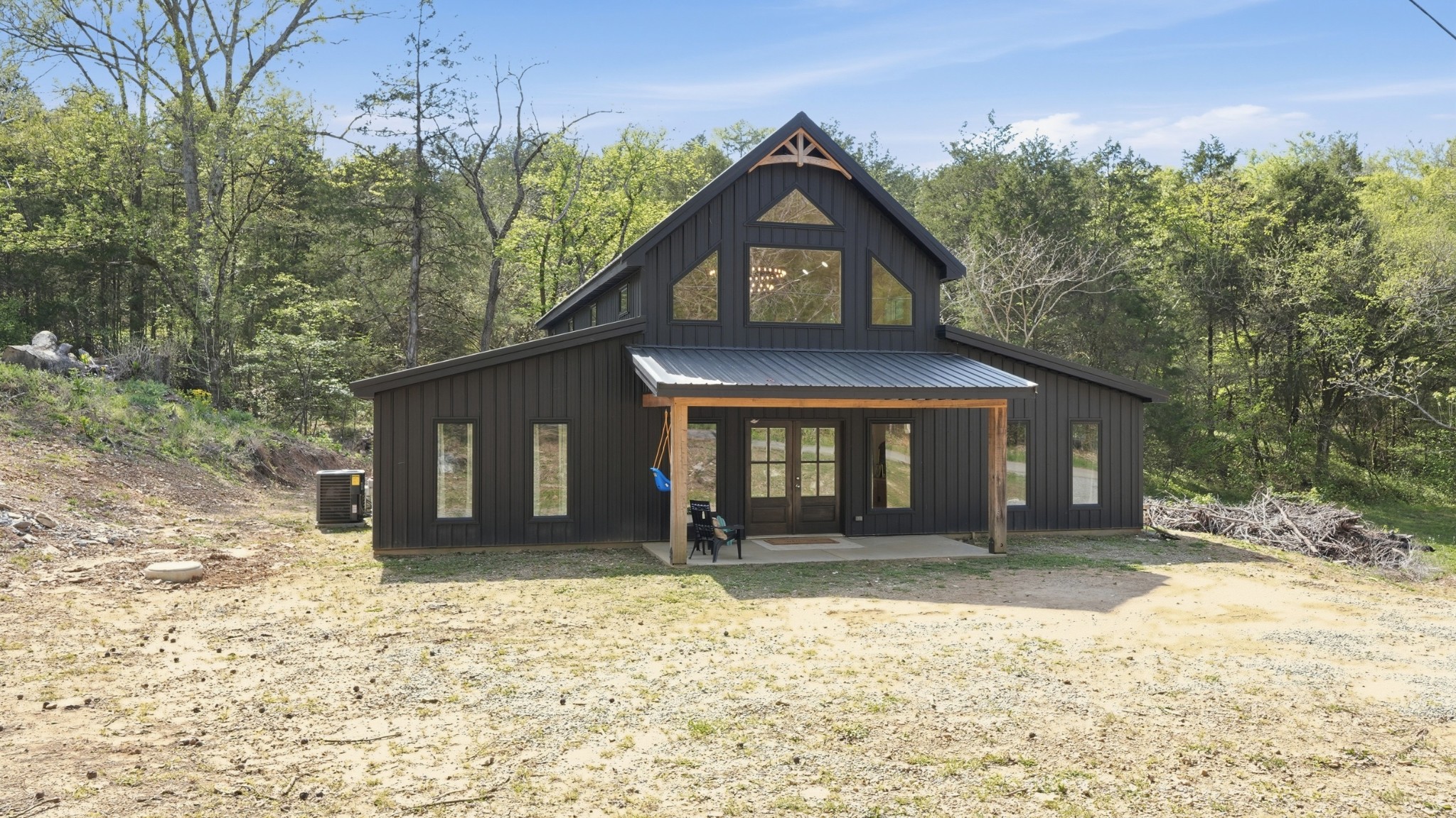 318 Robinson Road Dellrose, TN 38453 - Photo 52 of 56 a front view of a house with a yard