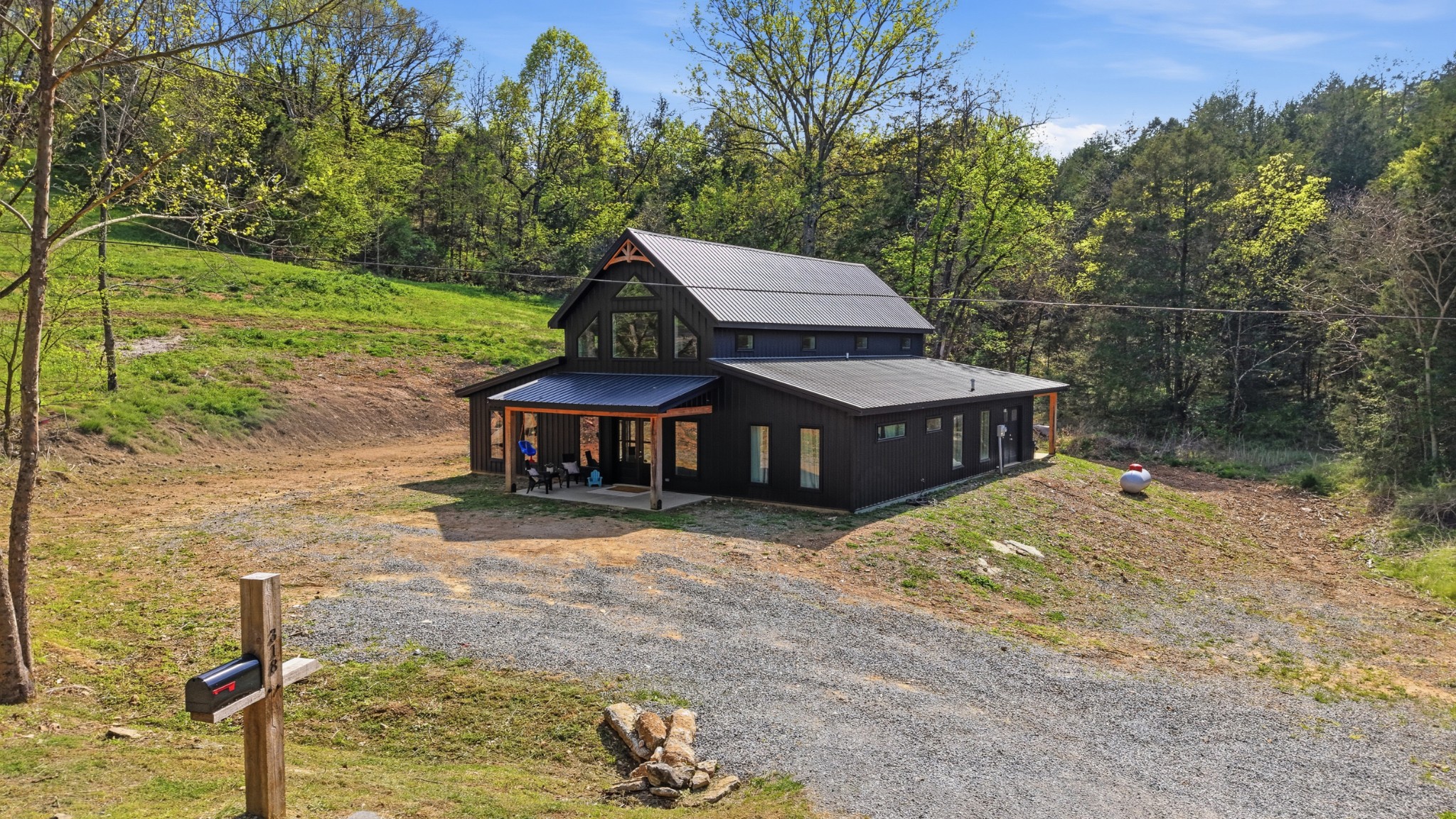 318 Robinson Road Dellrose, TN 38453 - Photo 53 of 56 a house with trees in the background