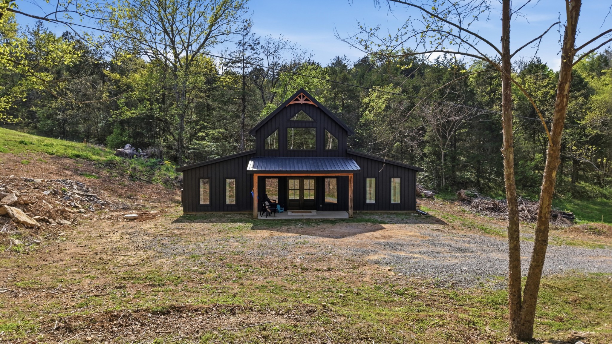 318 Robinson Road Dellrose, TN 38453 - Photo 56 of 56 a front view of a house with a yard