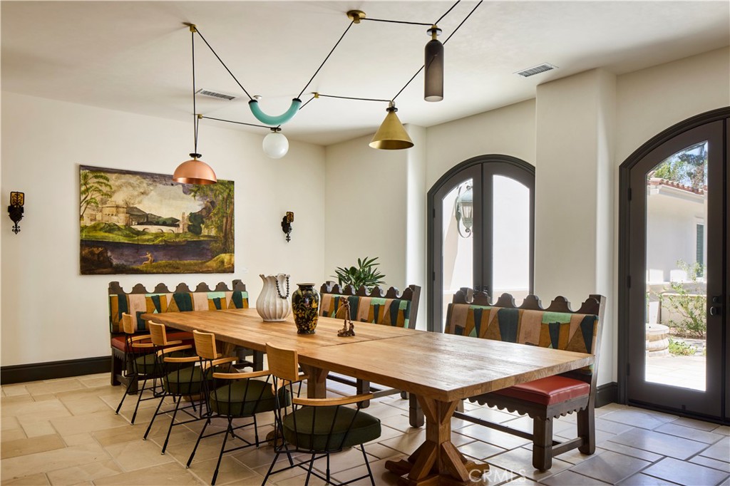 2019 Polo Court Riverside, CA 92506 - Photo 9 of 26 The dining room is filled with natural light has french doors that open to the private front courtyard.