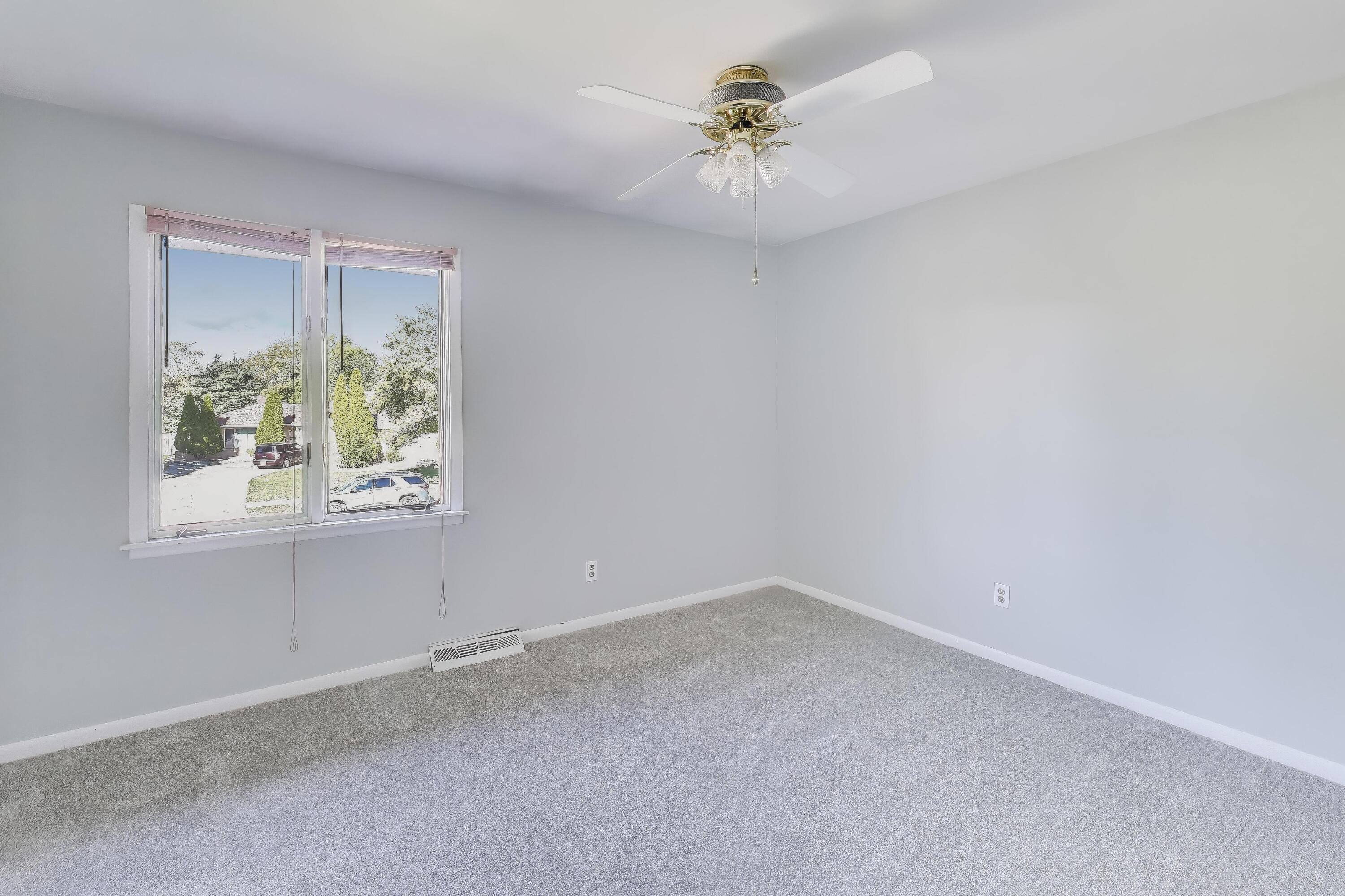9449 Primrose Lane Munster, IN 46321 - Photo 20 of 34 an empty room with a window