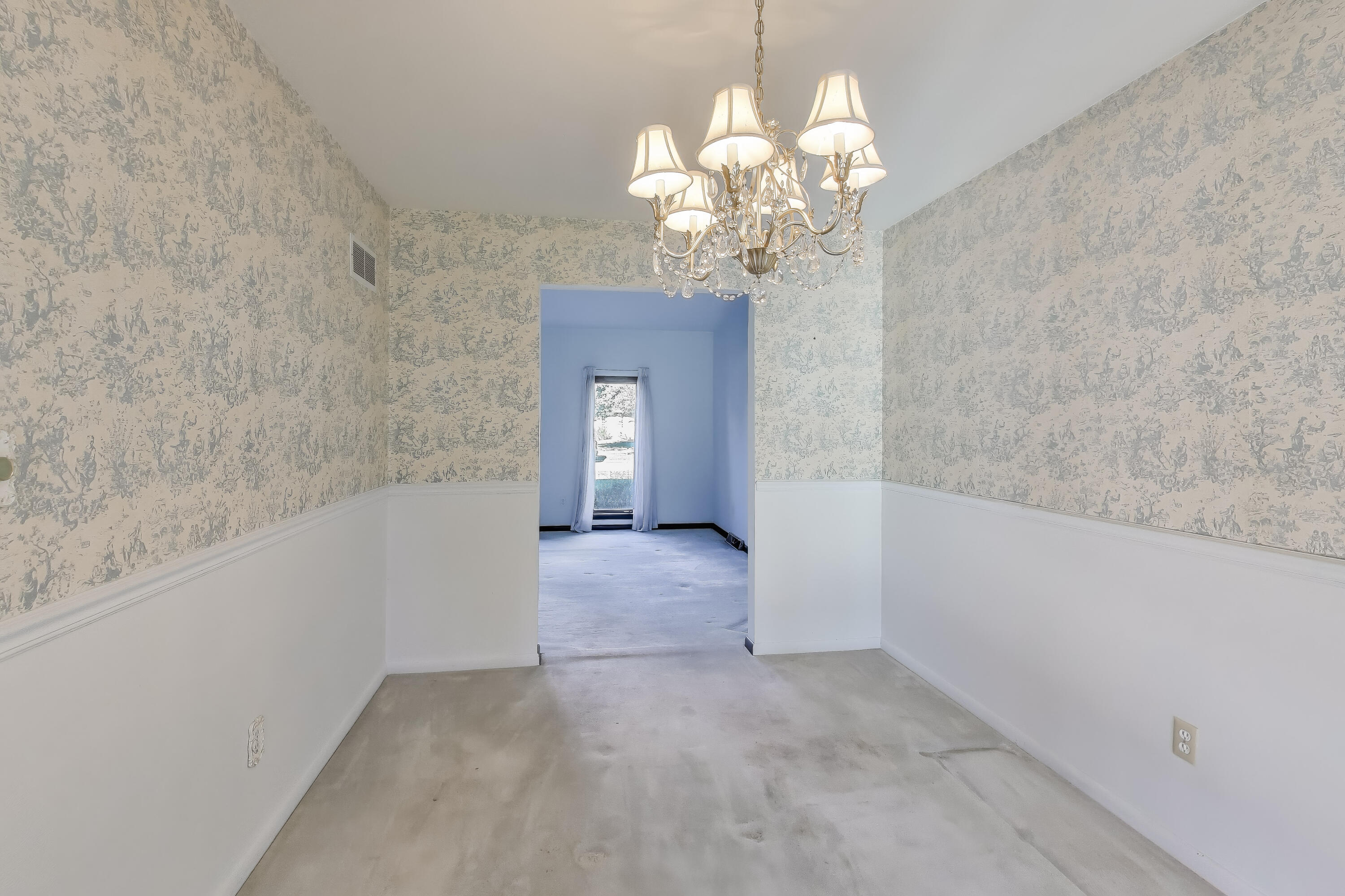 9449 Primrose Lane Munster, IN 46321 - Photo 6 of 34 a view of a livingroom with a chandelier