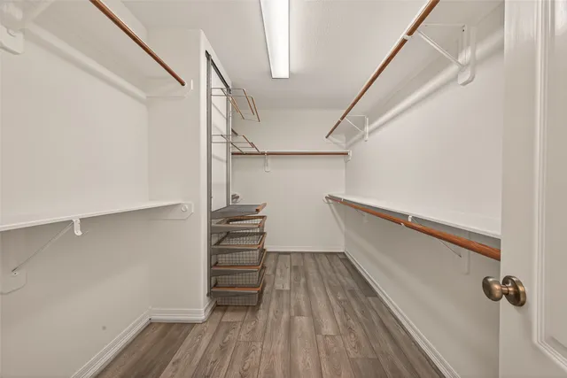 a view of entryway with stairs and wooden floor
