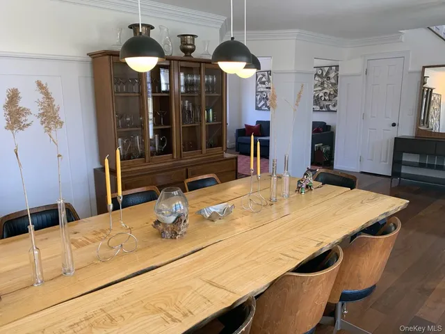 a kitchen with a table and chairs