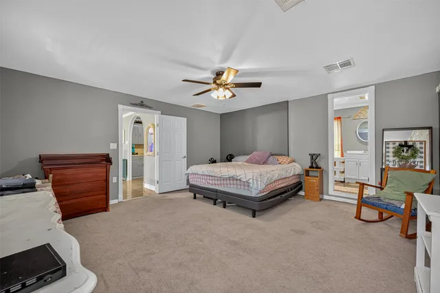 a view of an chairs and table in the patio