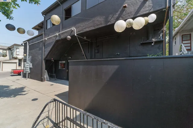 a close up of a wall with a potted plant