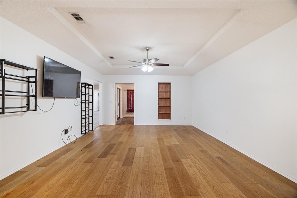201 Farm To Market 906 Powderly, TX 75473 - Photo 10 of 37 a view of a livingroom with wooden floor