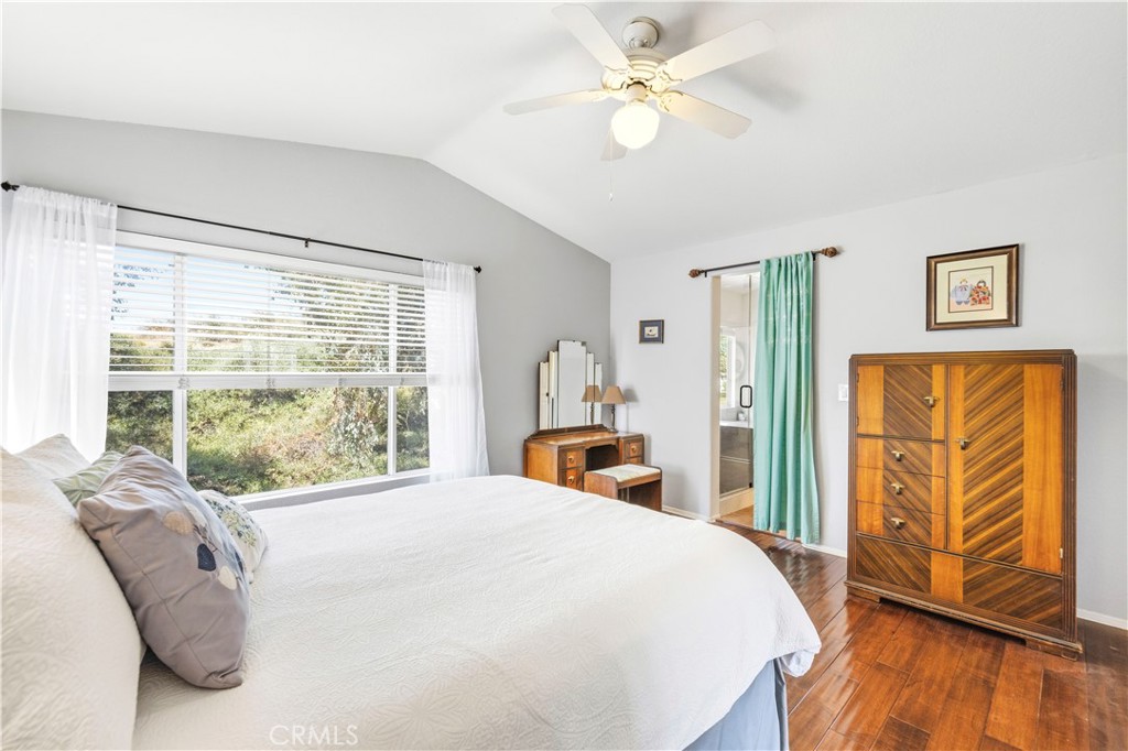 28033 Memory Lane Valencia, CA 91354 - Photo 25 of 40 a bedroom with a large bed and a window
