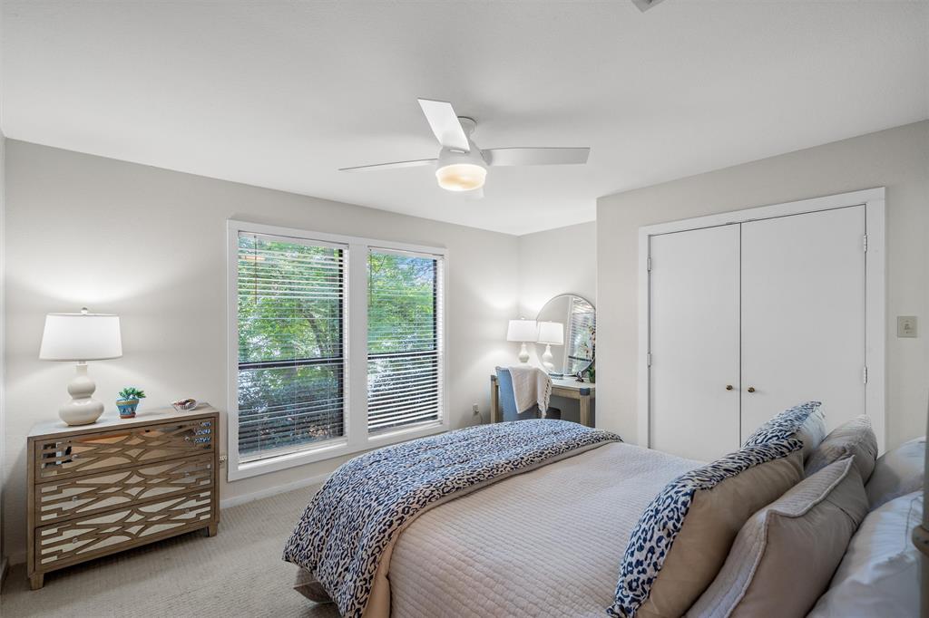 148 Pinewood Cove Holly Lake Ranch, TX 75765 - Photo 24 of 40 a bedroom with a bed and a dresser