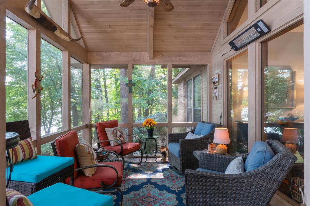 148 Pinewood Cove Holly Lake Ranch, TX 75765 - Photo 30 of 40 a living room with furniture and a large window