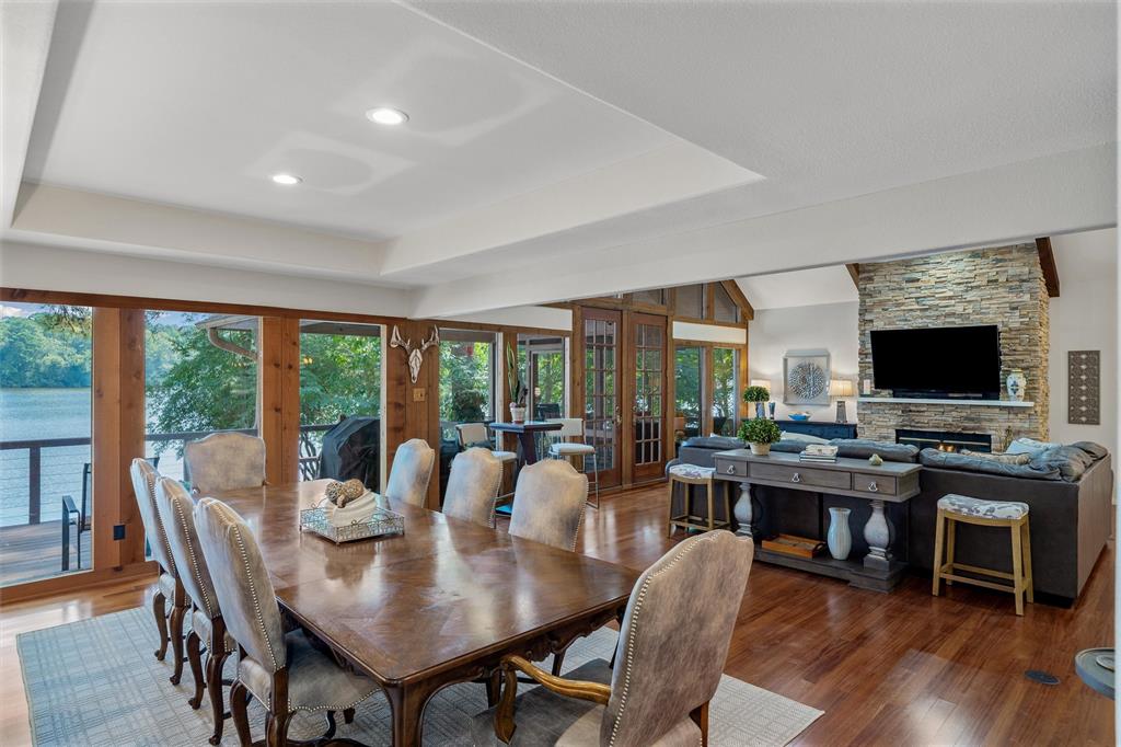 148 Pinewood Cove Holly Lake Ranch, TX 75765 - Photo 7 of 40 a view of a dining room with furniture window and wooden floor