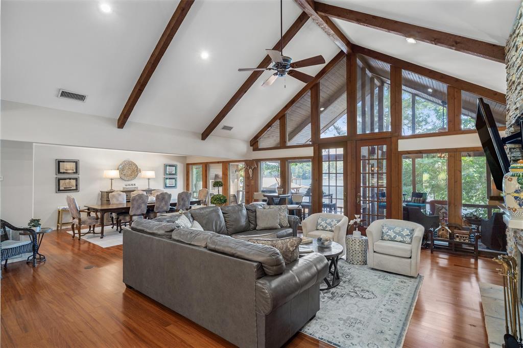 148 Pinewood Cove Holly Lake Ranch, TX 75765 - Photo 8 of 40 a living room with furniture or couch and a large window