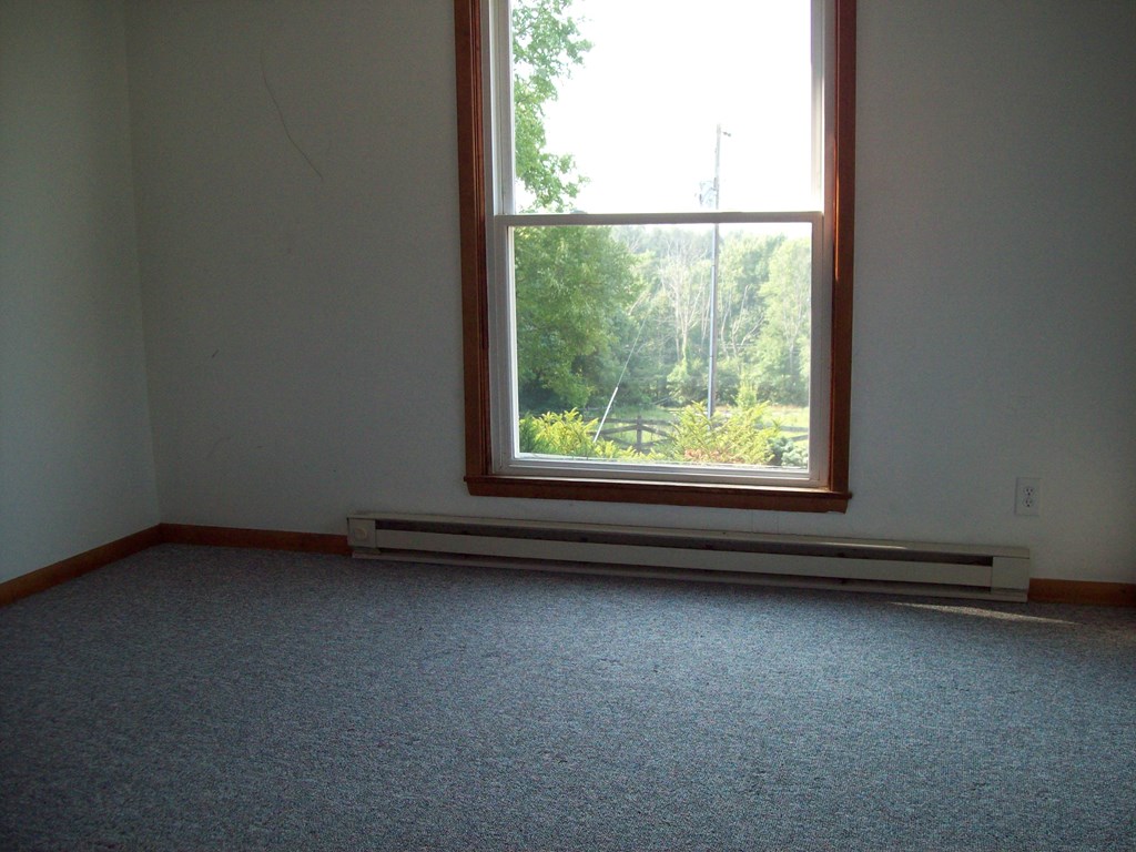 28014 State Rte 27 Guys Mills, PA 16327 - Photo 13 of 22 an empty room with a window