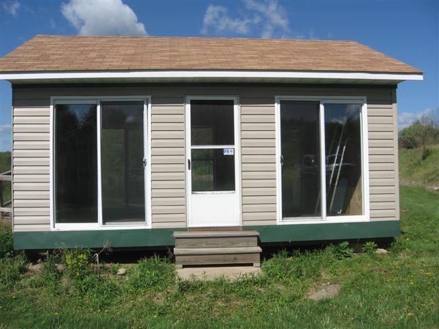 28014 State Rte 27 Guys Mills, PA 16327 - Photo 22 of 22 a front view of a house with a garden