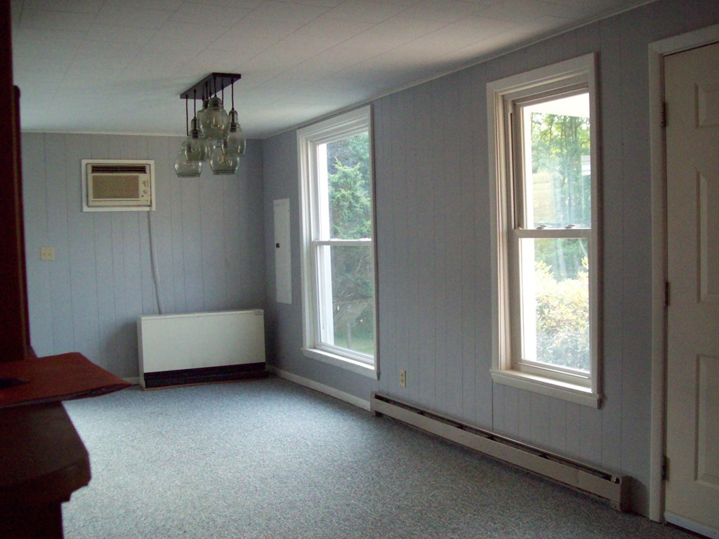 28014 State Rte 27 Guys Mills, PA 16327 - Photo 5 of 22 a living room with furniture and a window