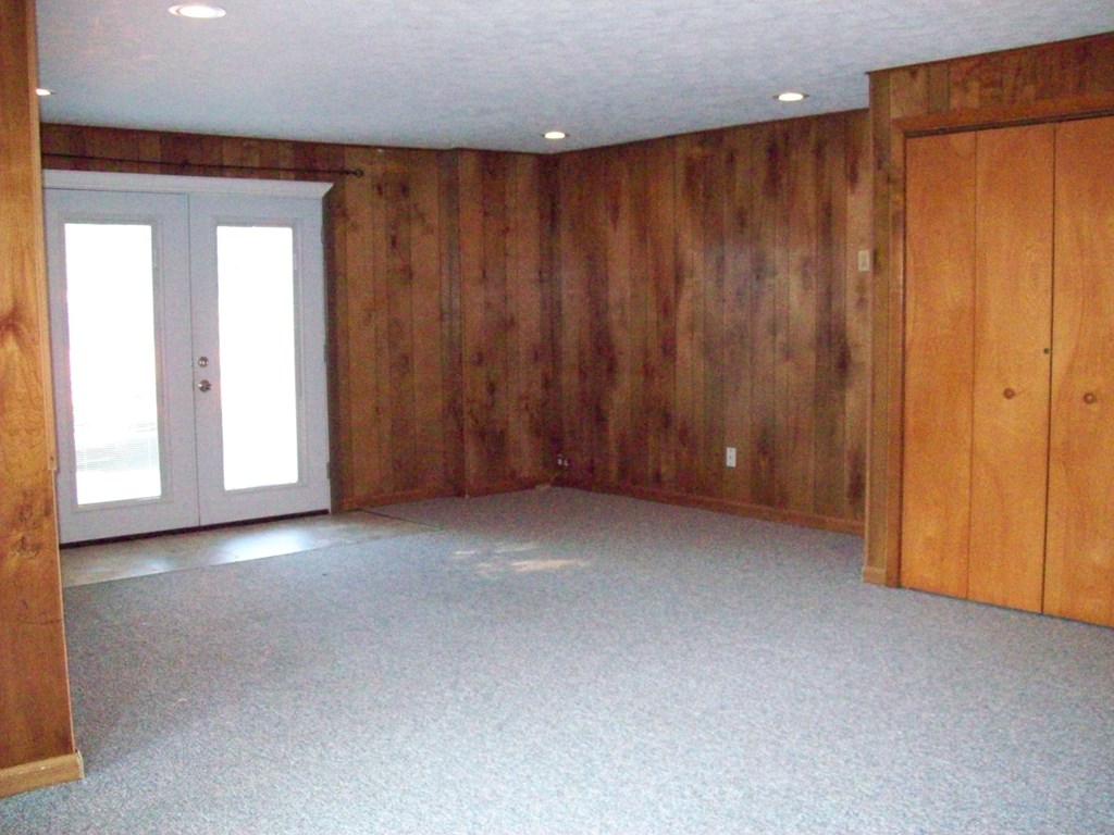28014 State Rte 27 Guys Mills, PA 16327 - Photo 10 of 22 a view of a livingroom with a wooden door