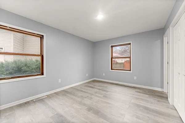 an empty room with windows