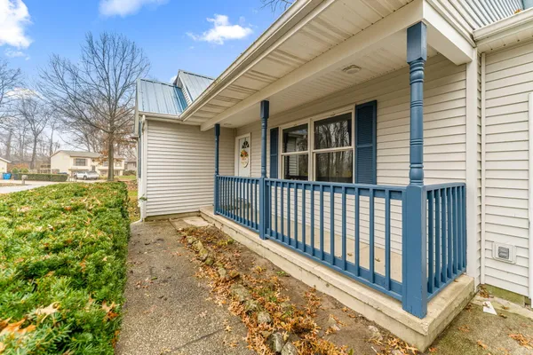 a front view of a house having yard