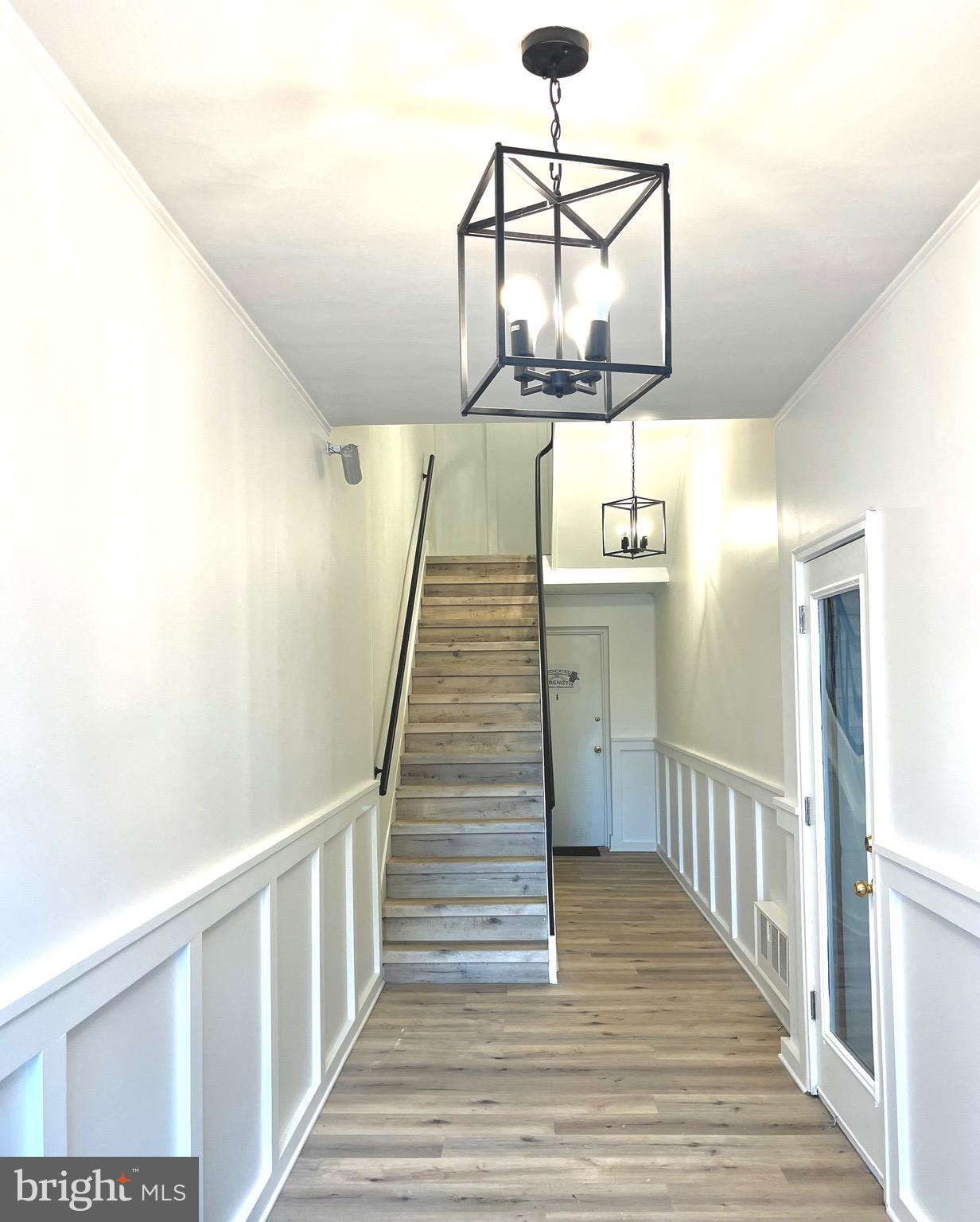 1802 11th Street Northwest, Unit 2A Washington, DC 20001 - Photo 13 of 15 a view of entryway and hall with wooden floor