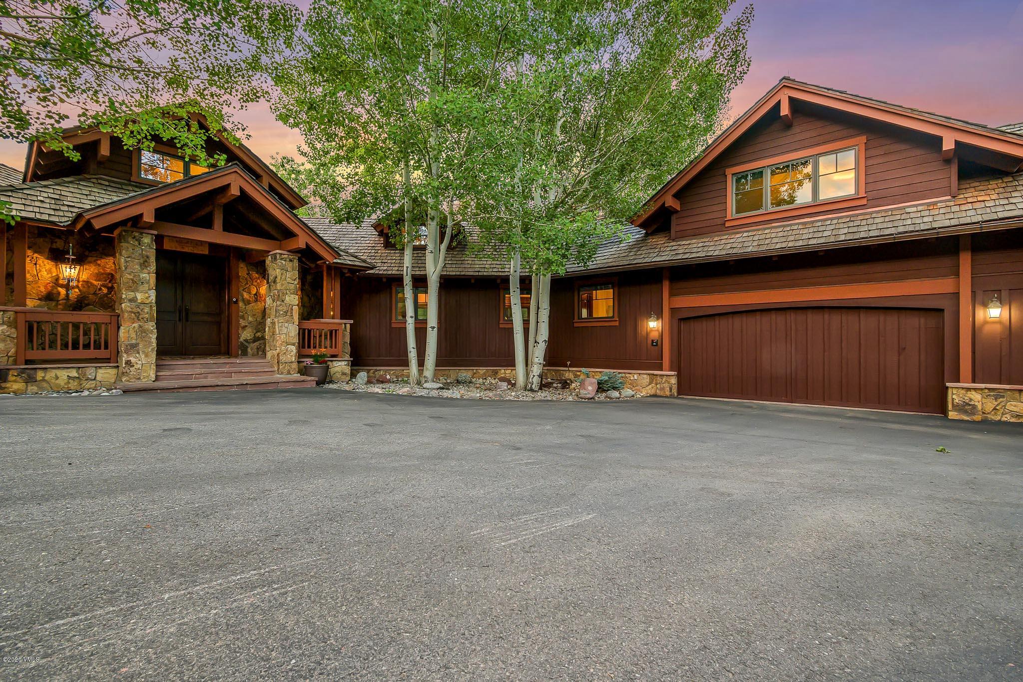 a front view of a house with a garage