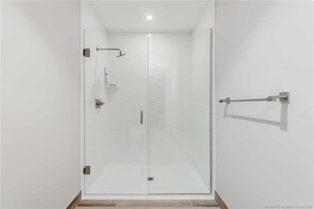 41 Southwest Seminole Street, Unit 305 Stuart, FL 34994 - Photo 20 of 50 a bathroom with a shower