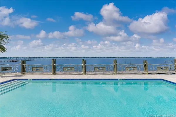 a aerial view of a house with a yard