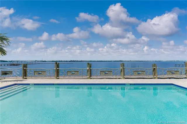 a aerial view of a house with a yard