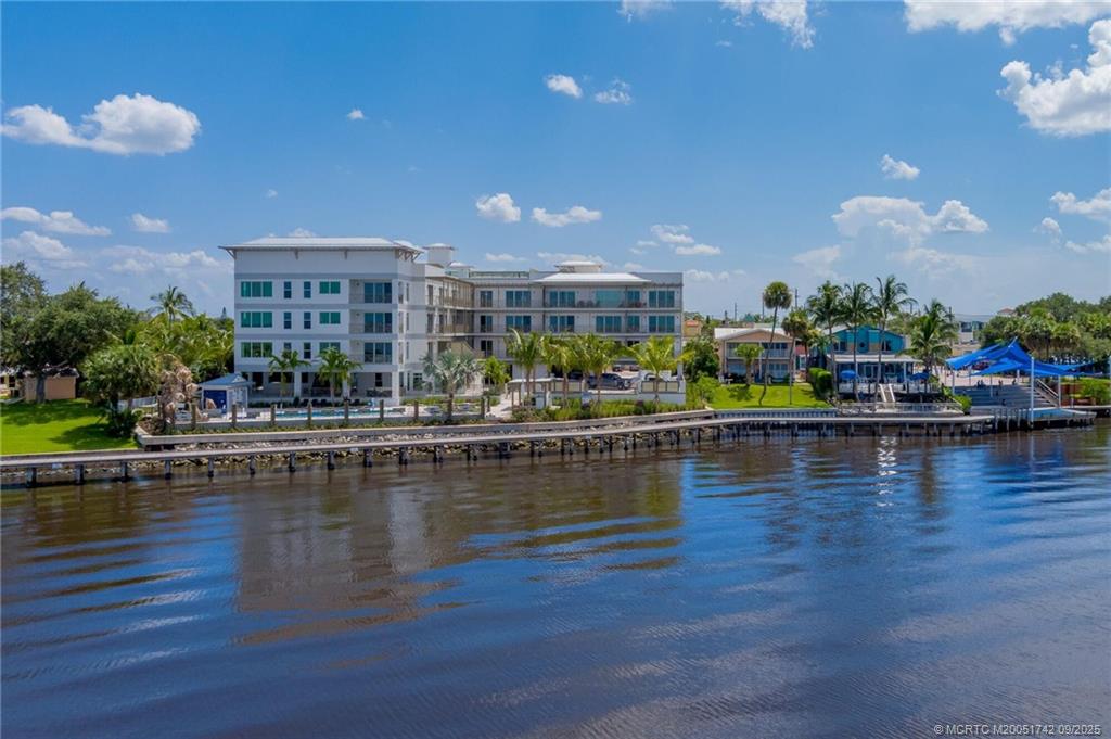 41 Southwest Seminole Street, Unit 305 Stuart, FL 34994 - Photo 27 of 50 a view of an ocean from a balcony