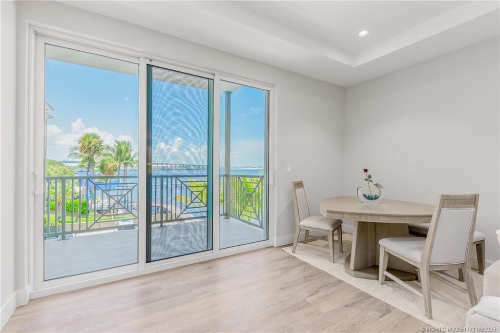 41 Southwest Seminole Street, Unit 305 Stuart, FL 34994 - Photo 8 of 50 a view of an empty room with a window