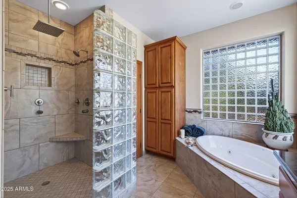 a bathroom with a sink double vanity and a mirror