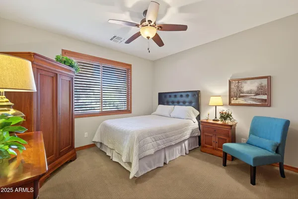 a living room with furniture and decor