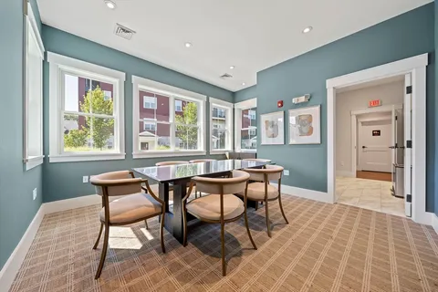 a view of swimming pool with chairs