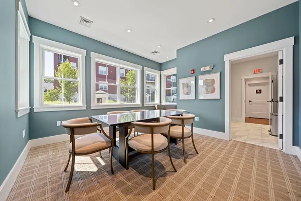 a view of swimming pool with chairs