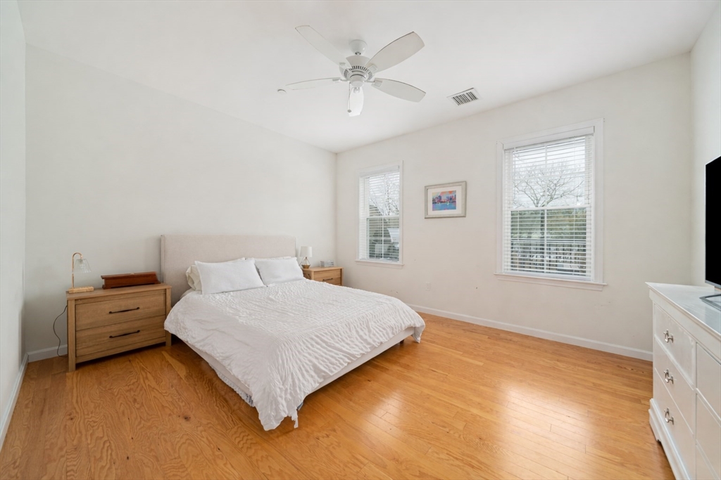 200 Revere Street, Unit 4104 Canton, MA 02021 - Photo 10 of 28 a bedroom with a bed and window