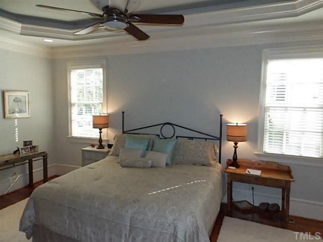 2515 Anderson Drive Raleigh, NC 27608 - Photo 5 of 25 First floor master suite with trey ceiling and ceiling fan.