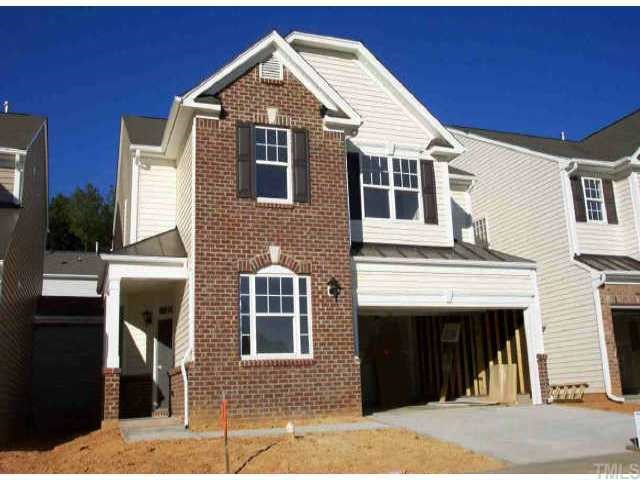 8506 Pillar Gate Lane Raleigh, NC 27613 - Photo 1 of 1 a front view of a house with a yard