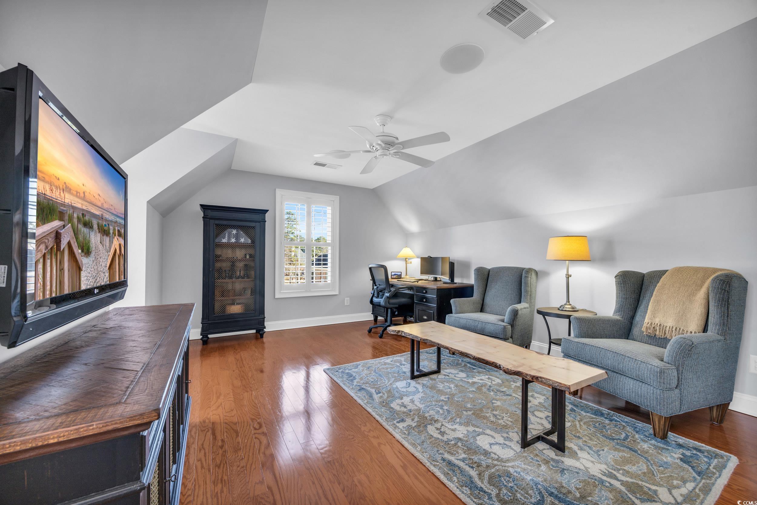 212 Minnow Lane Murrells Inlet, SC 29576 - Photo 23 of 37 Living room featuring ceiling fan, dark hardwood /