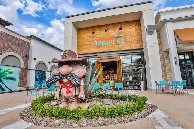 a view of a chairs and tables in the patio