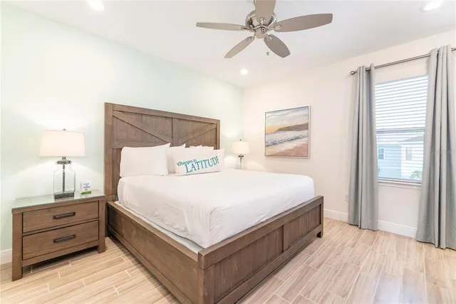 a bed room with a bed and a window