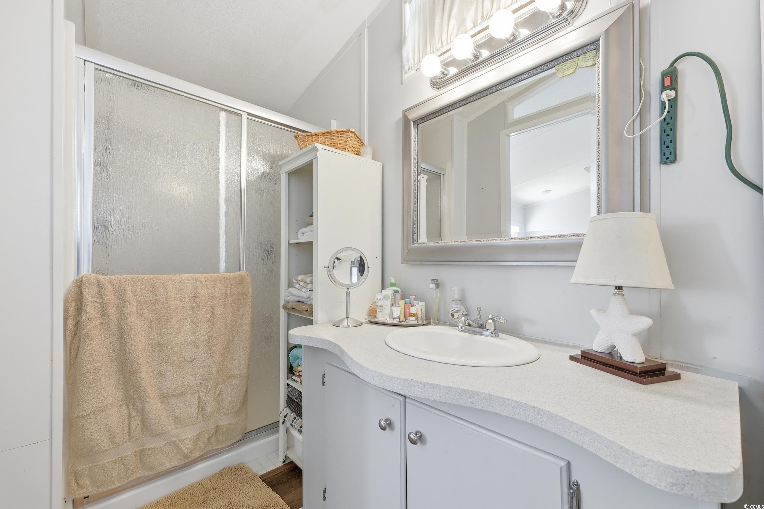 1017 Foxfire Drive North Myrtle Beach, SC 29582 - Photo 18 of 36 Full bath featuring vanity and a shower stall