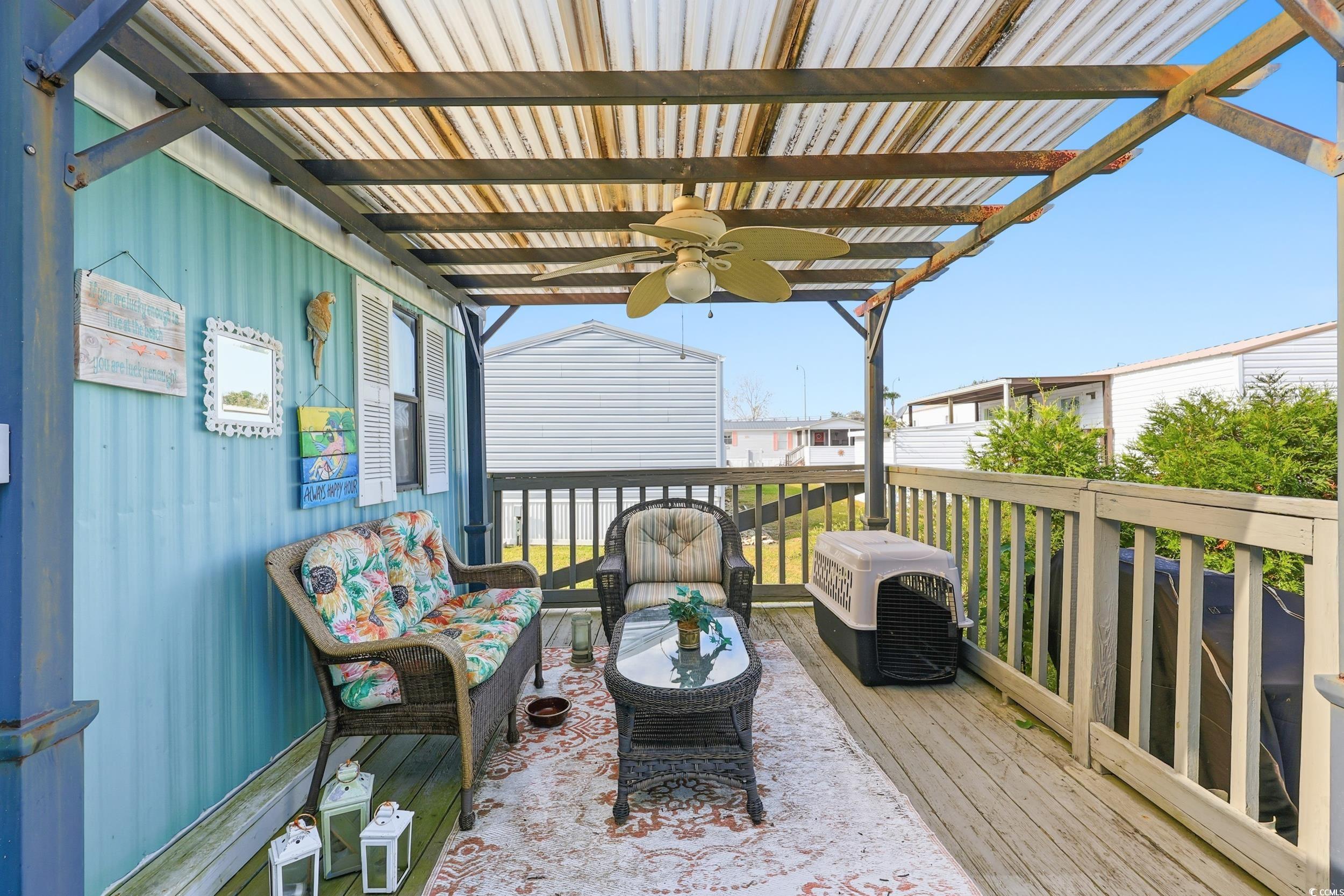 1017 Foxfire Drive North Myrtle Beach, SC 29582 - Photo 24 of 36 Wooden terrace featuring ceiling fan