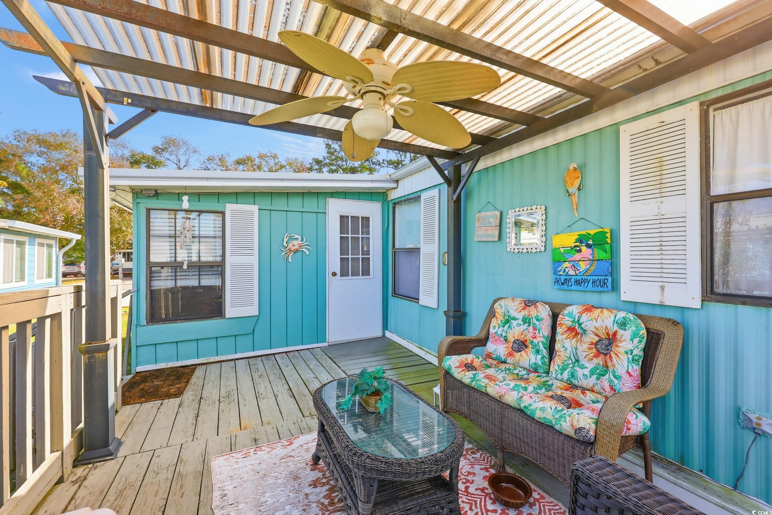1017 Foxfire Drive North Myrtle Beach, SC 29582 - Photo 25 of 36 Deck featuring ceiling fan and outdoor lounge area