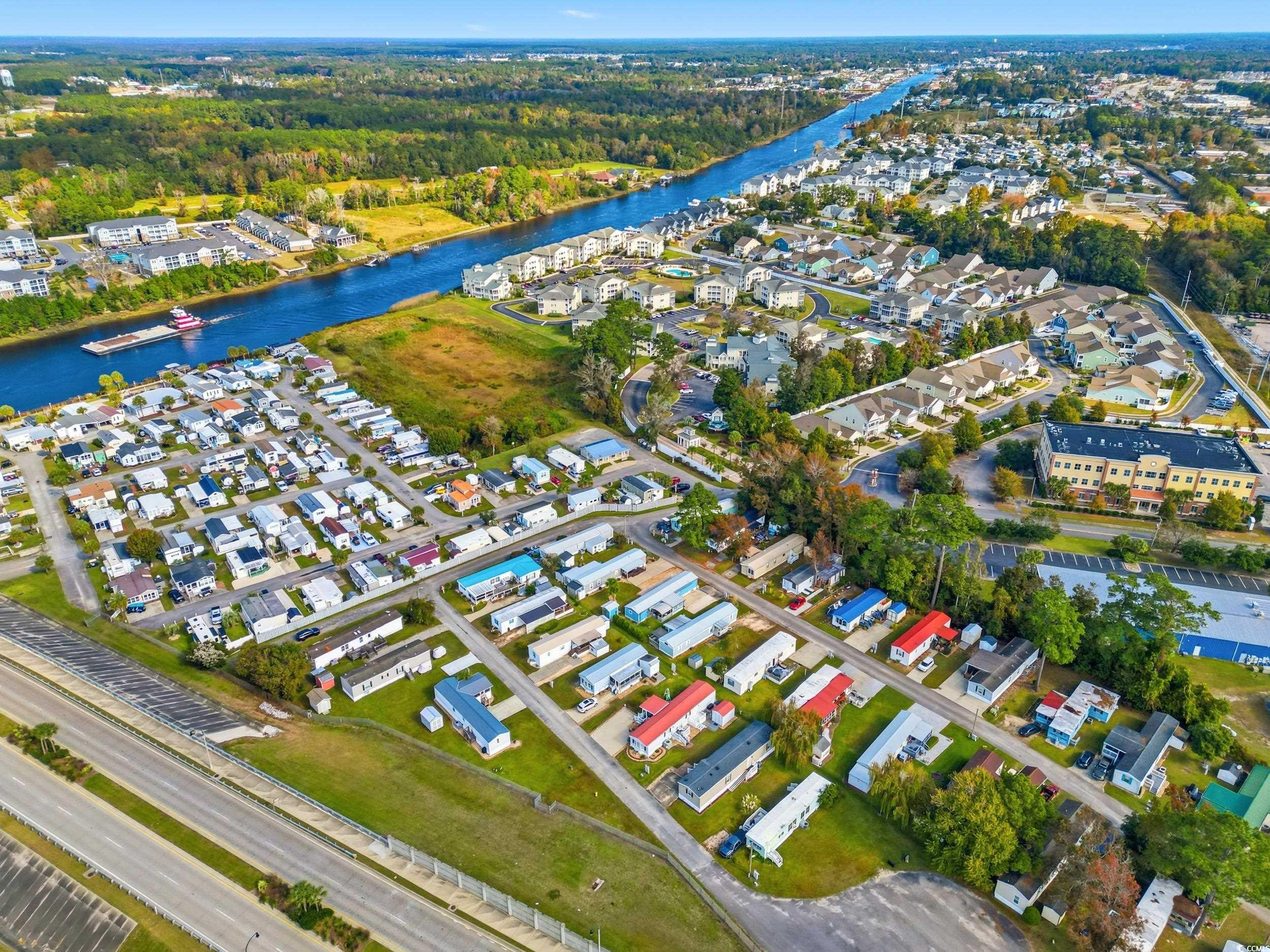 1017 Foxfire Drive North Myrtle Beach, SC 29582 - Photo 30 of 36 View of property location featuring nearby suburban area and a nearby body of water
