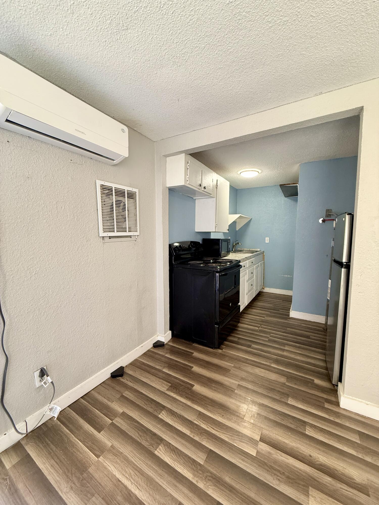 2109 22nd Street, Unit REAR Lubbock, TX 79411 - Photo 6 of 11 a view of a kitchen with a sink