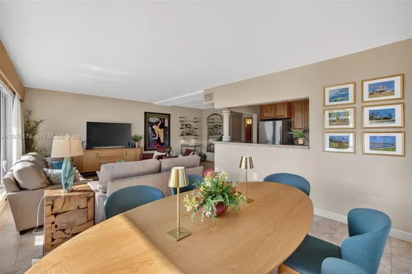 a kitchen with cabinets and stainless steel appliances
