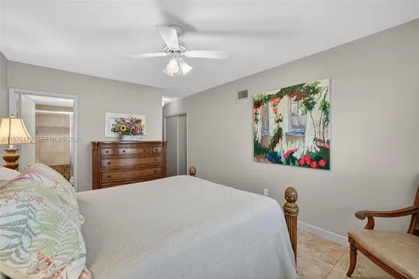 a view of a patio with couches and a table and chairs