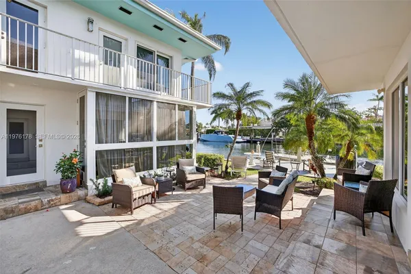 a view of a terrace with sitting area