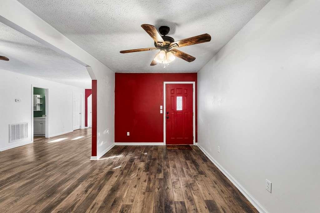 118 Jordan Road Blairsville, GA 30512 - Photo 3 of 49 a view of an empty room with wooden floor