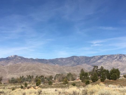 0 Pioneer Road Weldon, CA 93283 - Photo 8 of 14 a view of a town with mountains in the background