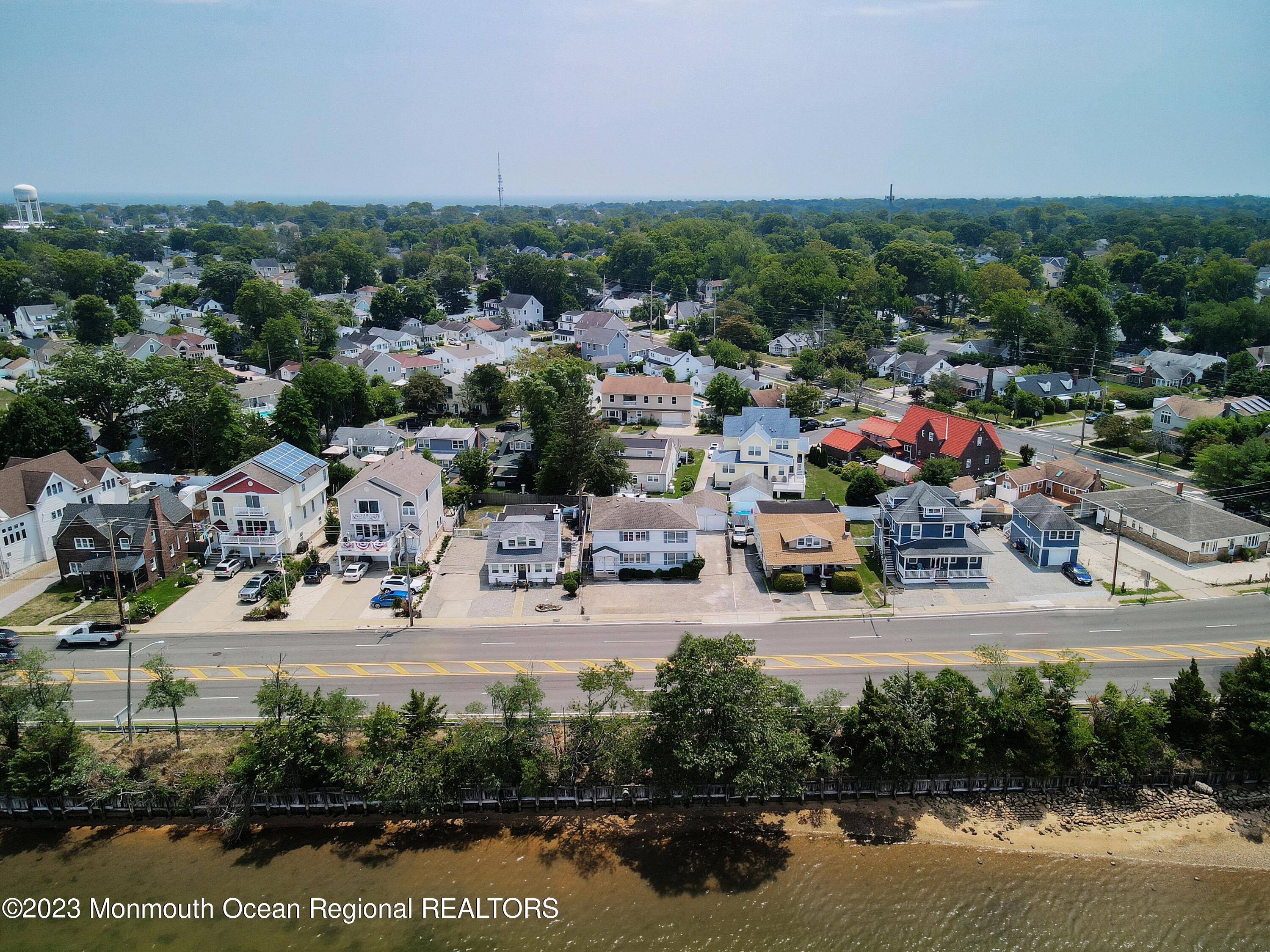 1719 River Road Belmar, NJ 07719 - Photo 7 of 32 an aerial view of a house with a lake view
